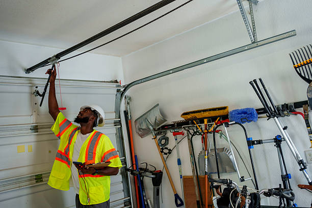 Professional Garage Door Panel Replacement technician working in North Bend, OR